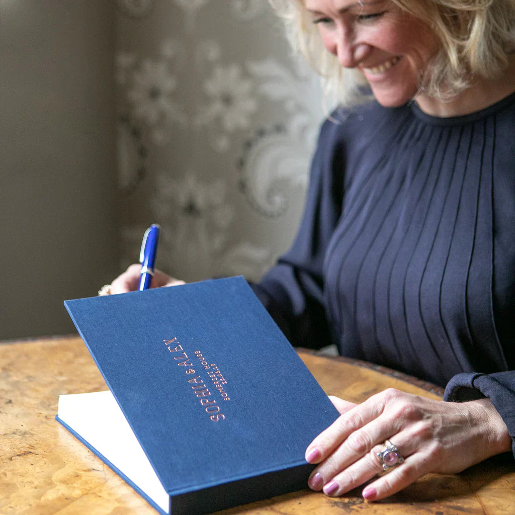 Image of a dark blue linen photo album